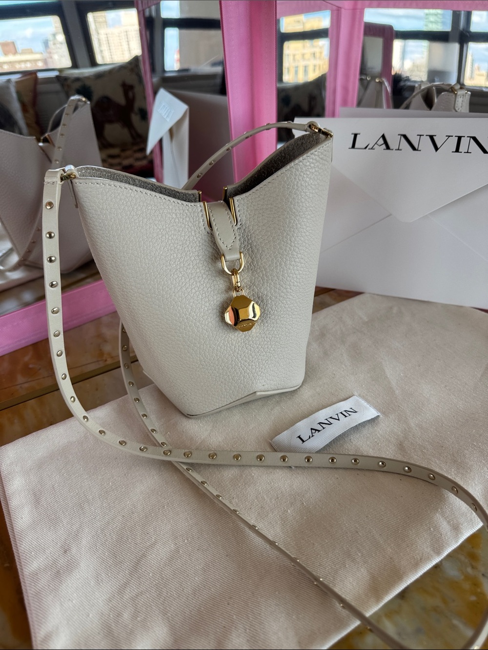 Lanvin Ivory Pebbled Leather Mini Bucket Bag with Gold Charm